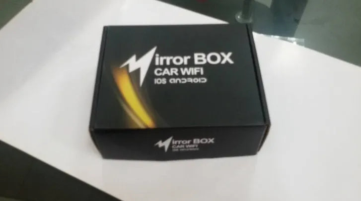 Black car Wi-Fi mirror link box with power cable, AV cable, antenna, and user manual for screen mirroring.