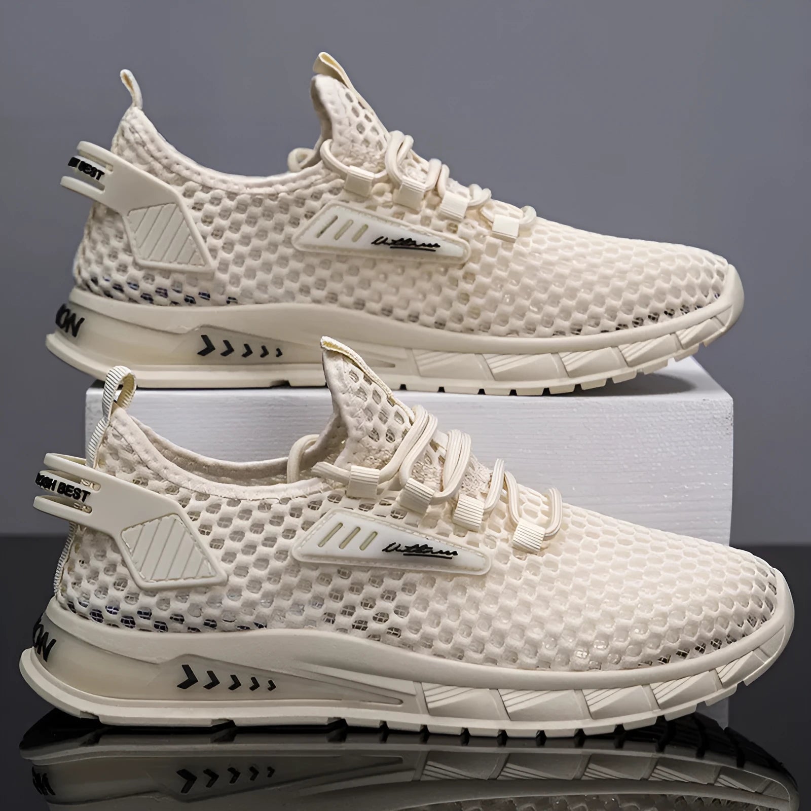 Men's beige casual sneaker with mesh lining, synthetic leather upper, and flat EVA sole on a plain background.
