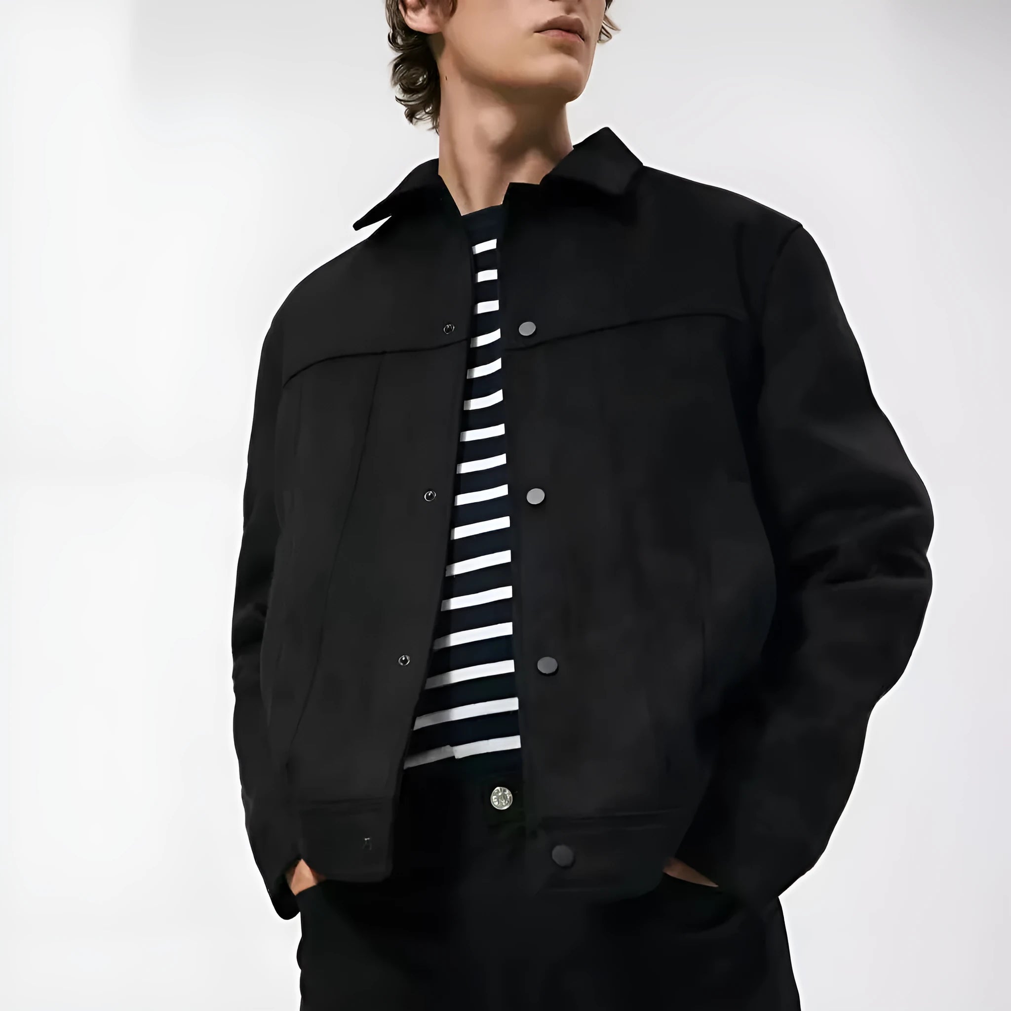 Black men's hooded casual jacket with a suede collar, showing side seam pockets and loose long sleeves.
