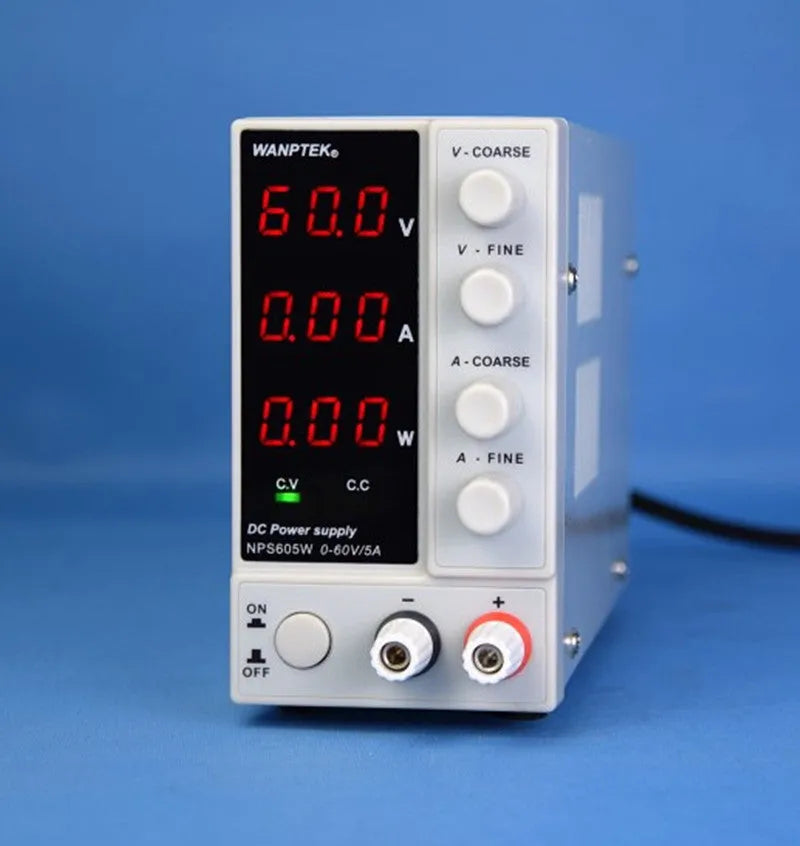 White NPS605W adjustable DC laboratory power supply with voltage and current controls for electronics repair.