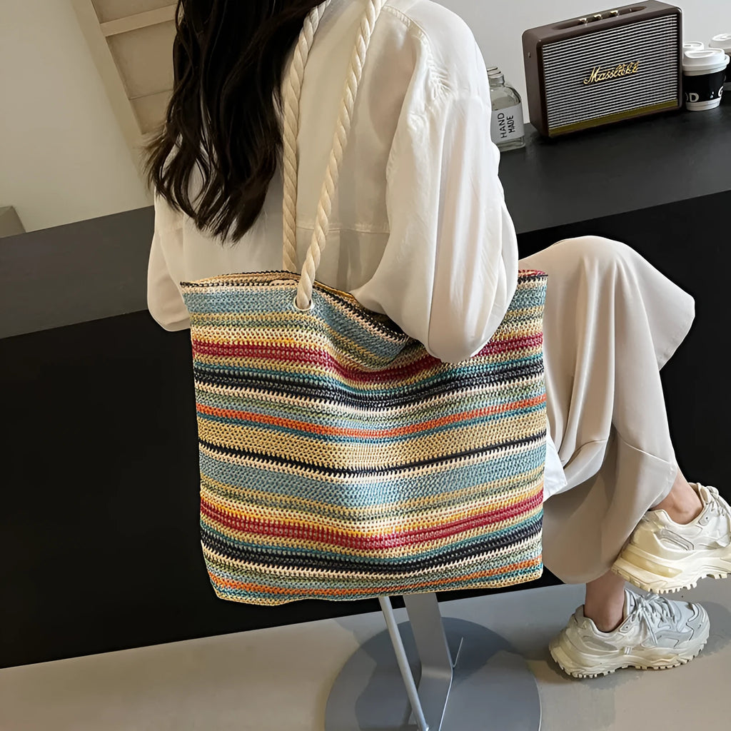 Blue straw woven nylon shoulder bag with polyester lining and single shoulder strap