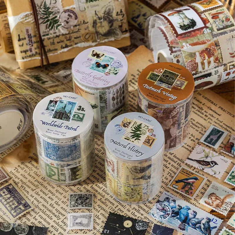 Roll of retro-style stamp stickers for journal decoration, showing butterfly, forest, bird and mushroom designs.