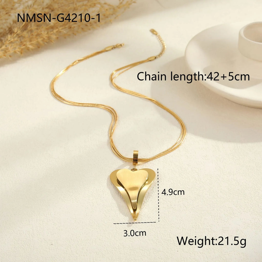 Stainless steel women's necklace with double heart geometric pendant on a snake bones chain.