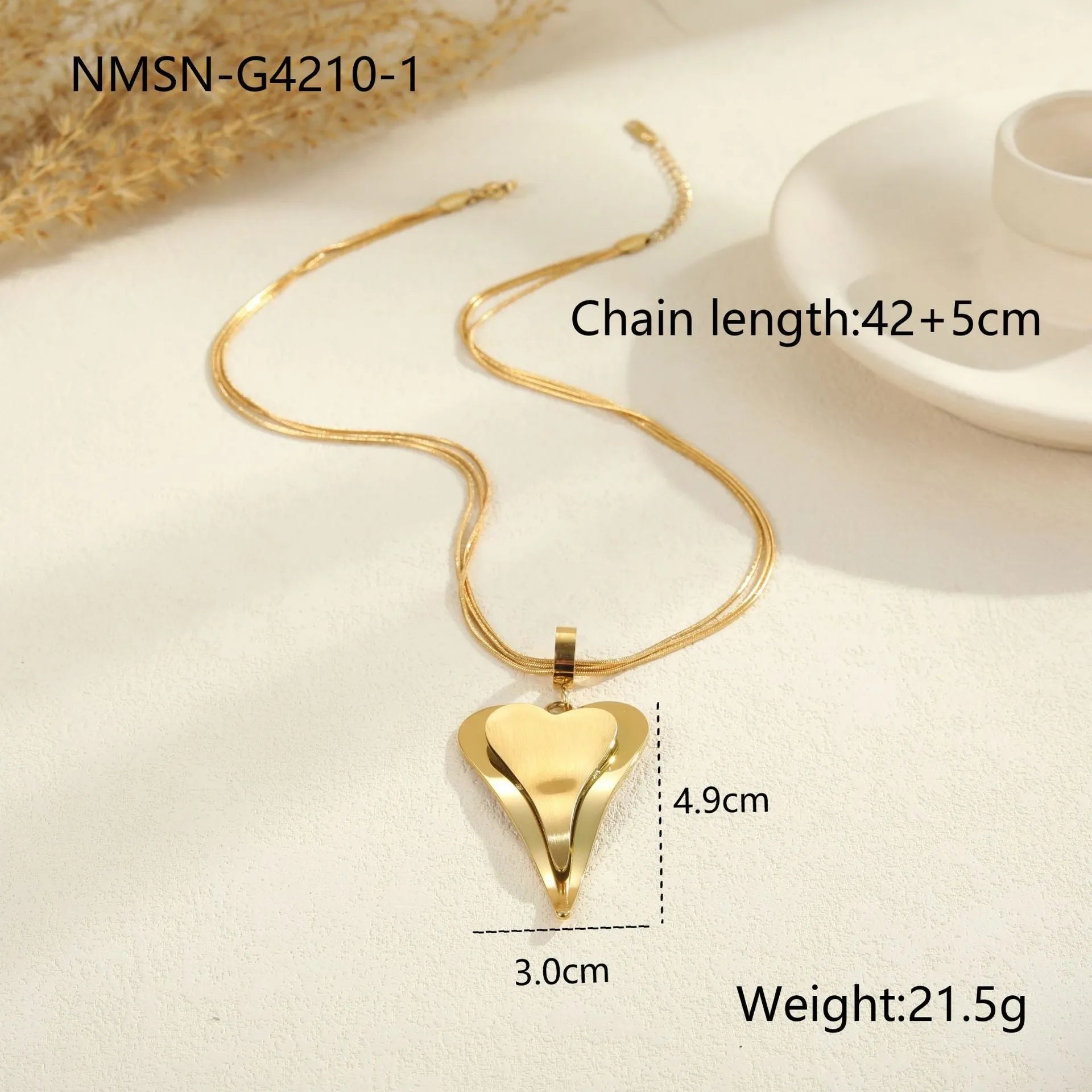 Stainless steel women's necklace with double heart geometric pendant on a snake bones chain.