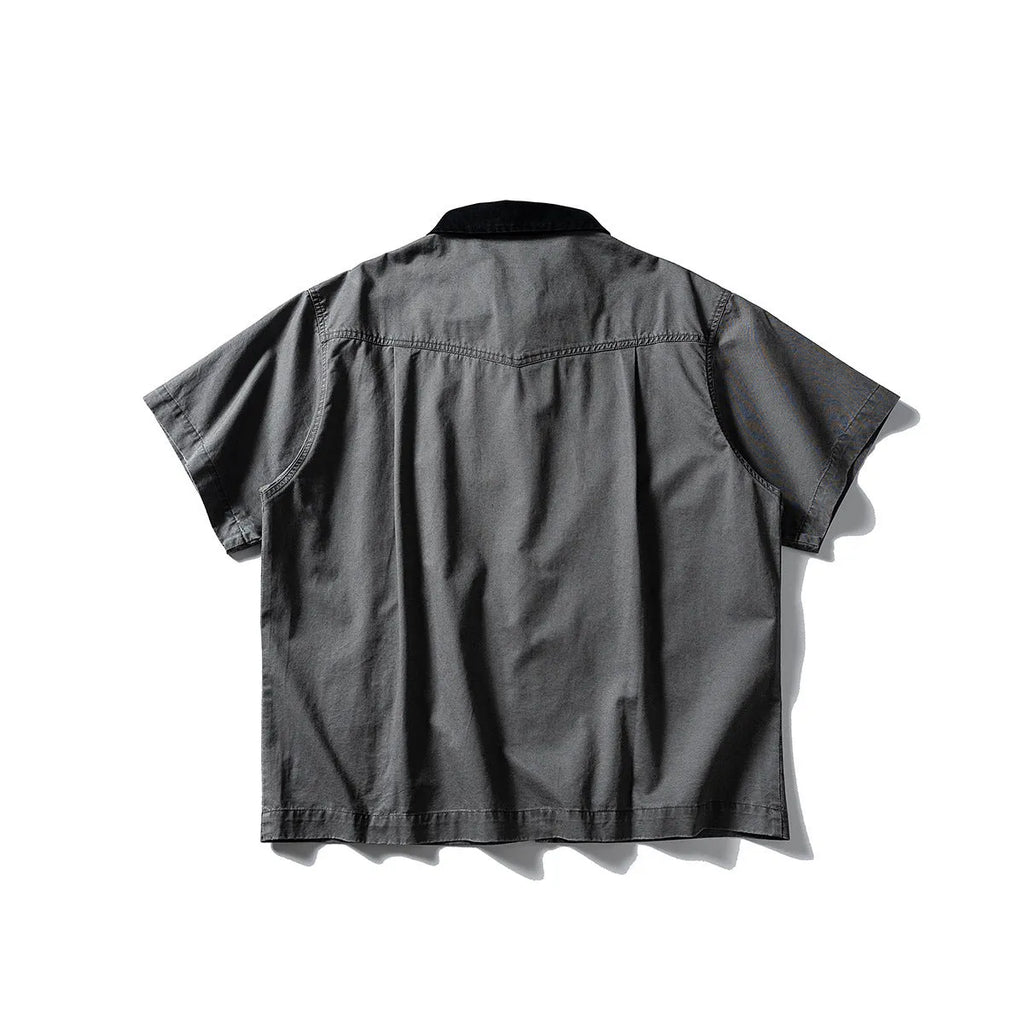 Washed cotton short-sleeve overalls shirt in loose cardigan style available in khaki or grey colours