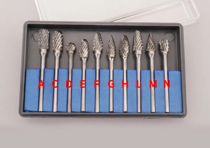 Ten tungsten steel carbide rotary burrs with 6mm head and 3mm shank arranged on a white background