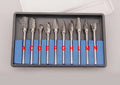 Ten tungsten steel carbide rotary burrs with 6mm head and 3mm shank arranged on a white background