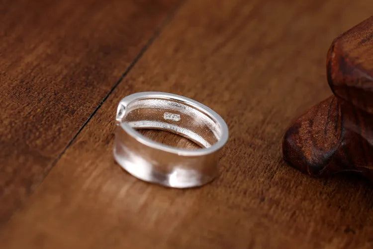 Geometric adjustable opening sterling silver ring with frosted finish and electroplated silver colour