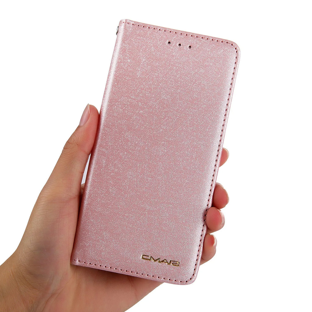 Black PU leather flip phone case for Apple iPhone with card slots open.