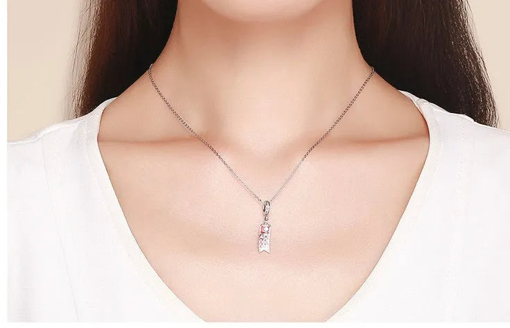 S925 sterling silver carp streamer pendant with oxidised finish, zircon stone, and oil drop decoration.