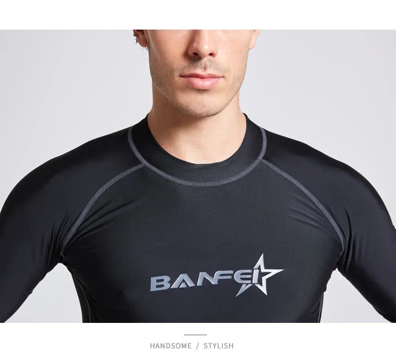 Men's half-sleeve nylon swimsuit set in blue for snorkelling and surfing with matching top and pants