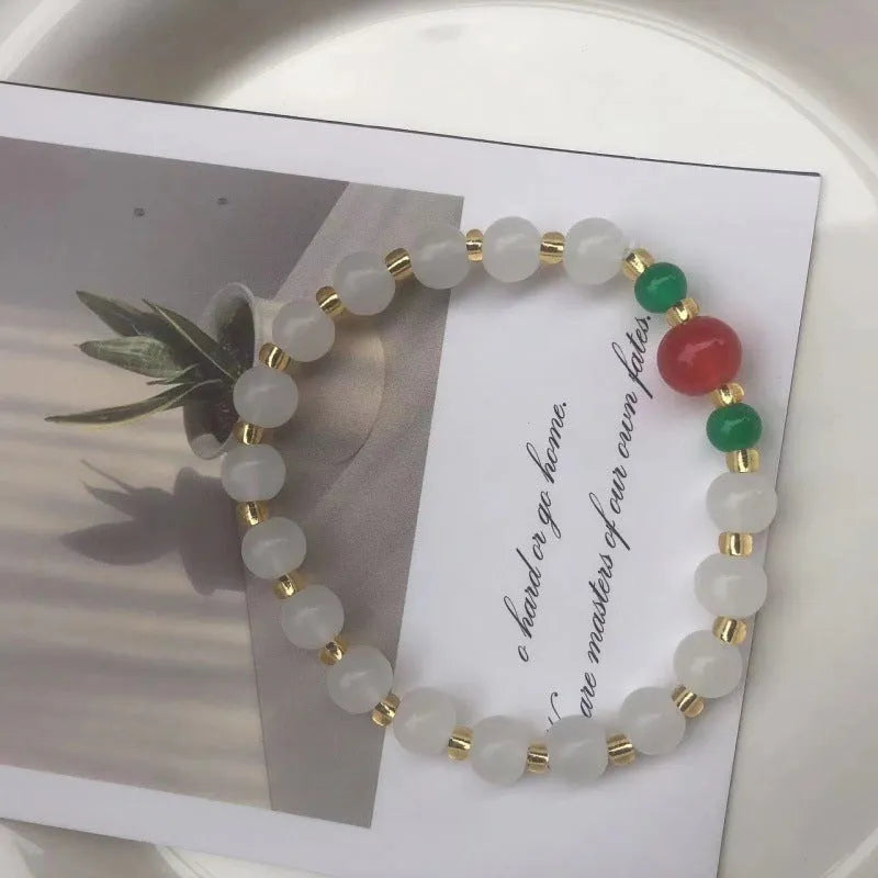 Chinese style glass bamboo leaf bracelet for women with manual craft details.