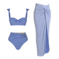 Women's solid colour one-piece swimsuit with matching skirt and gold button detail