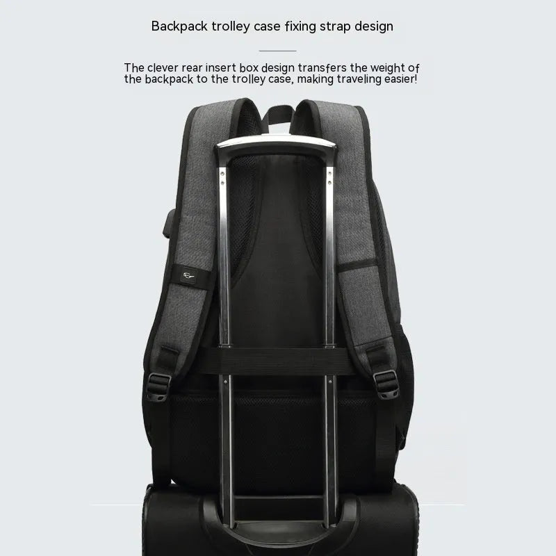 Grey lightweight backpack with USB charging port on strap and trolley sleeve.