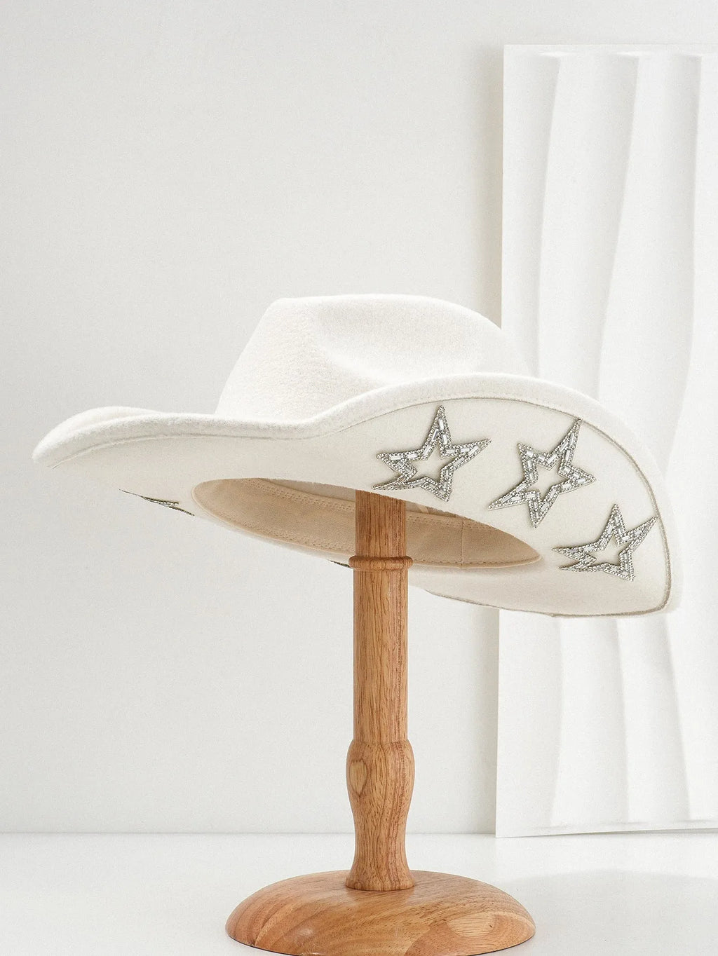 Beige polyester western-style top hat with a conical crown and a woven hexagonal star pattern.