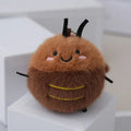 Small mink velvet cockroach pendant plush toy doll with black eyes, 8cm height, on a light background