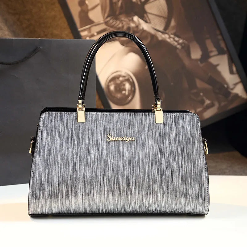 Medium PU leather messenger handbag in horizontal square shape with gold or silver contrast colour