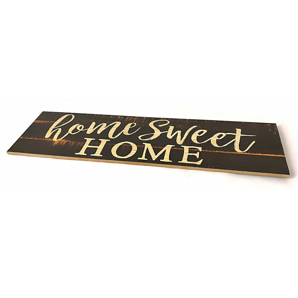 Carved wood Home Sweet Home hanging ornament in black, showing dimensions of 40cm wide.