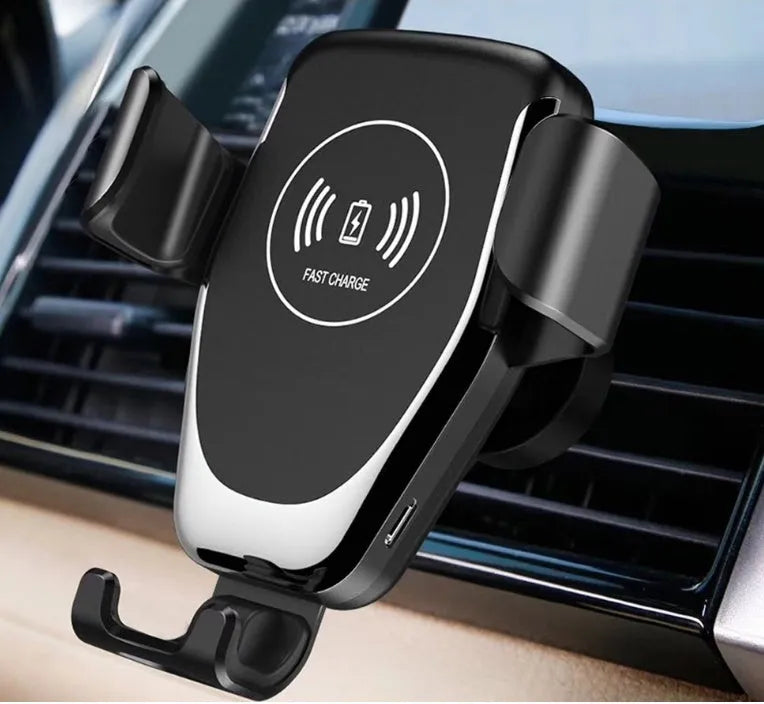 Car wireless charger mount holding iPhone with automatic clamping arms and dashboard mounting