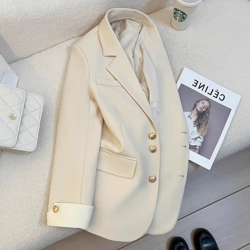 Korean-style women's coat in loose fit with pockets, available in Milky White or Black