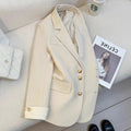 Korean-style women's coat in loose fit with pockets, available in Milky White or Black