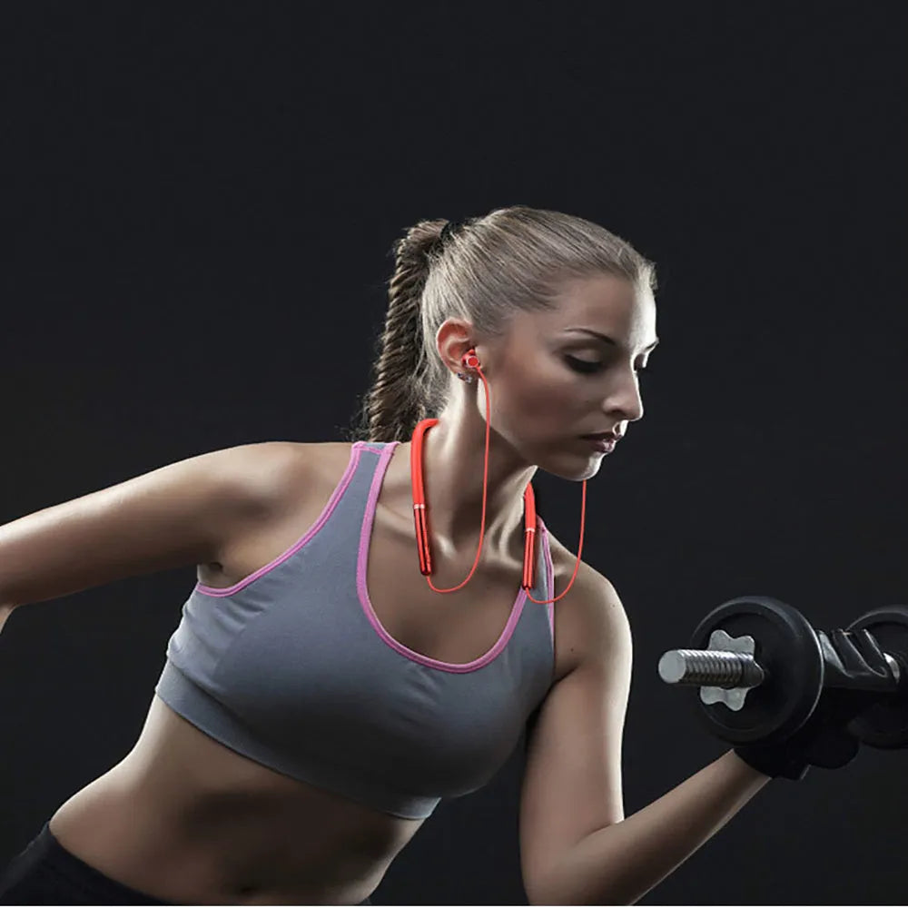 Magnetic sucker neck sports Bluetooth headset in black with necklace-style band and earbuds clipped together