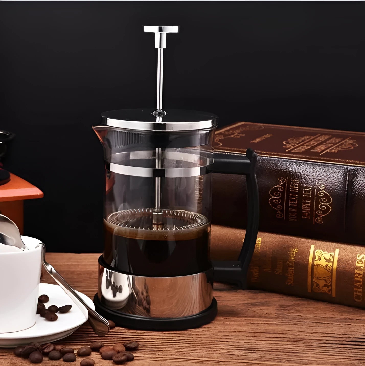 350ml manual French press coffee maker with glass carafe and stainless steel plunger, measuring 10cm by 8cm by 17cm.