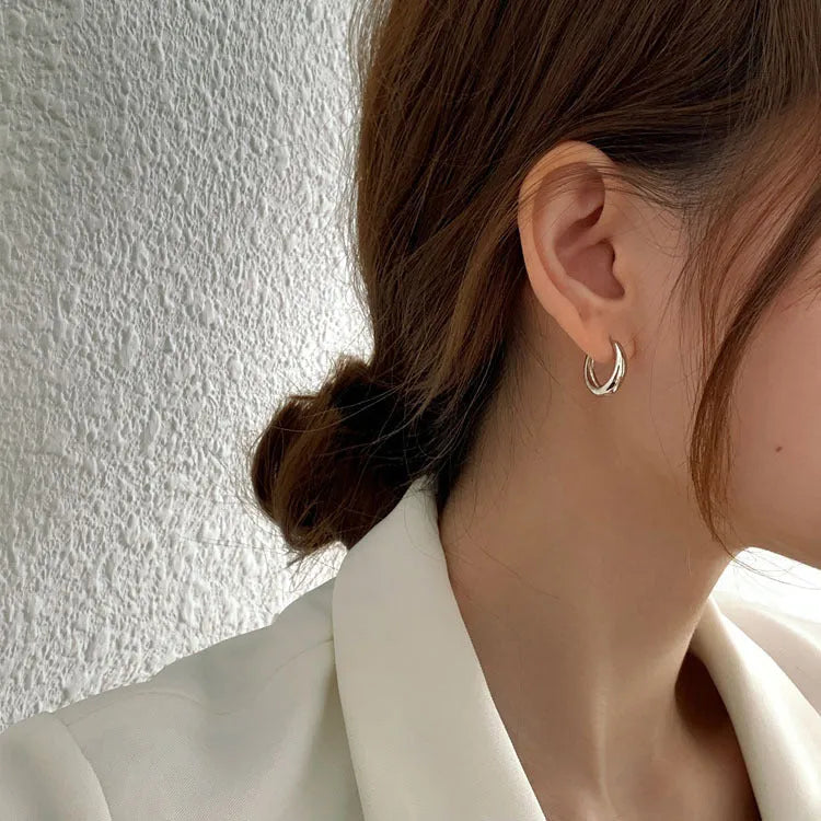 Women's geometric water drop earrings in gold and silver electroplated finishes with minimalist retro design