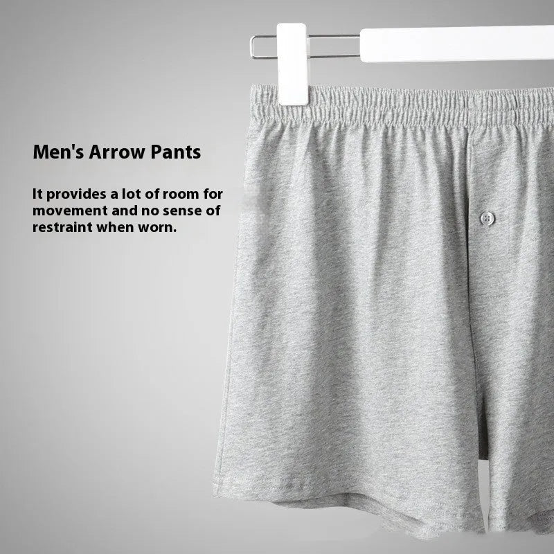 Men's solid colour cotton boxer shorts with a high waist and loose fit.