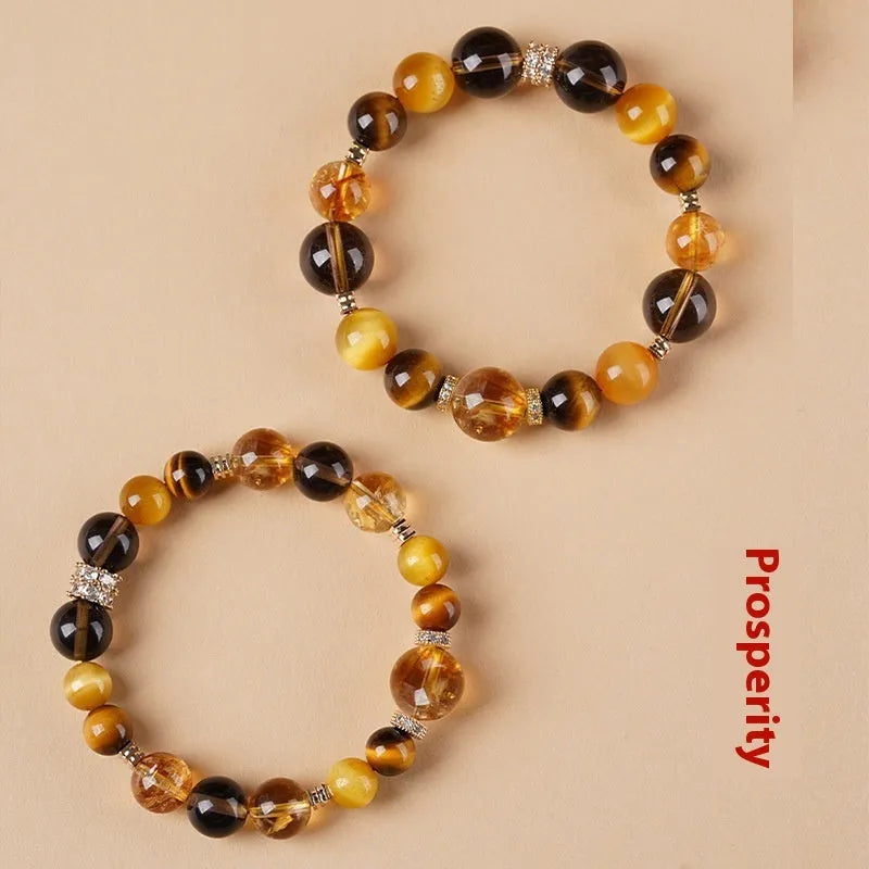 Yellow tower geometry tiger-eye crystal bracelet in 10mm and 12mm unisex sizes.