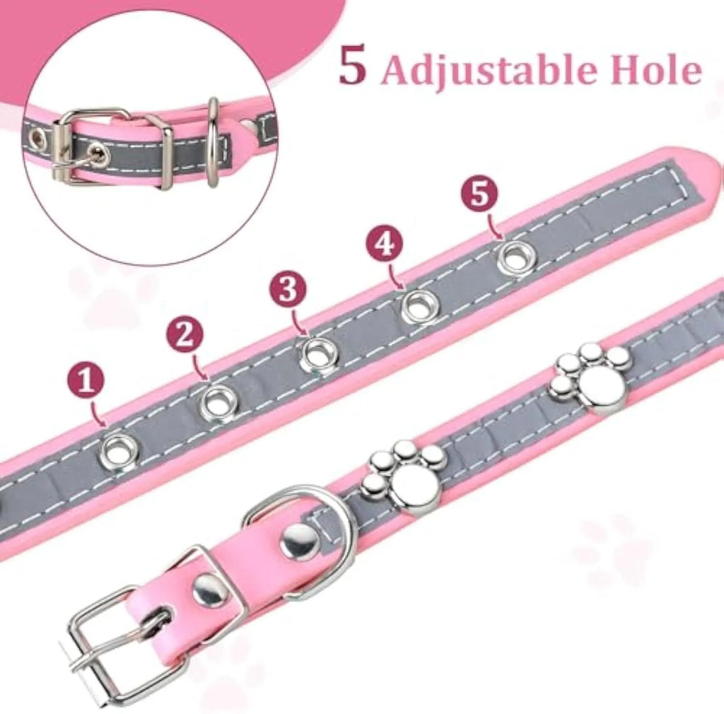 Reflective brown leather dog collar with metal paw print rivets and an adjustable buckle.