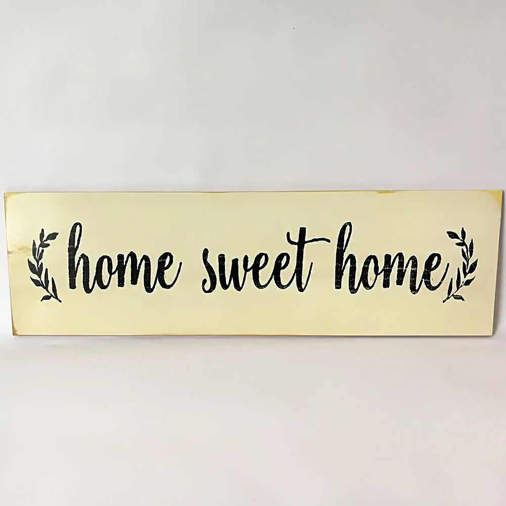 Carved wood Home Sweet Home hanging ornament in black, showing dimensions of 40cm wide.