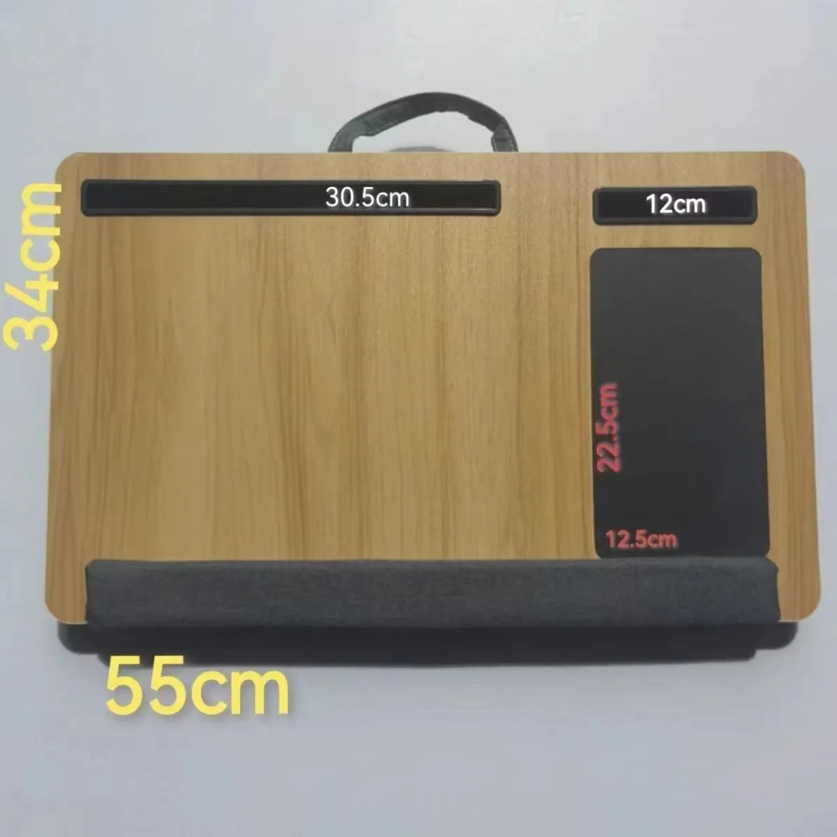 Foldable laptop bed desk with black walnut finish, open and ready for use on a bed