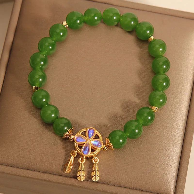 Original women's bracelet with a green jasper crystal four-leaf clover dream catcher pendant.