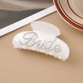 Pink and white 10cm acrylic shower hair clip with spot drill and letter decoration.