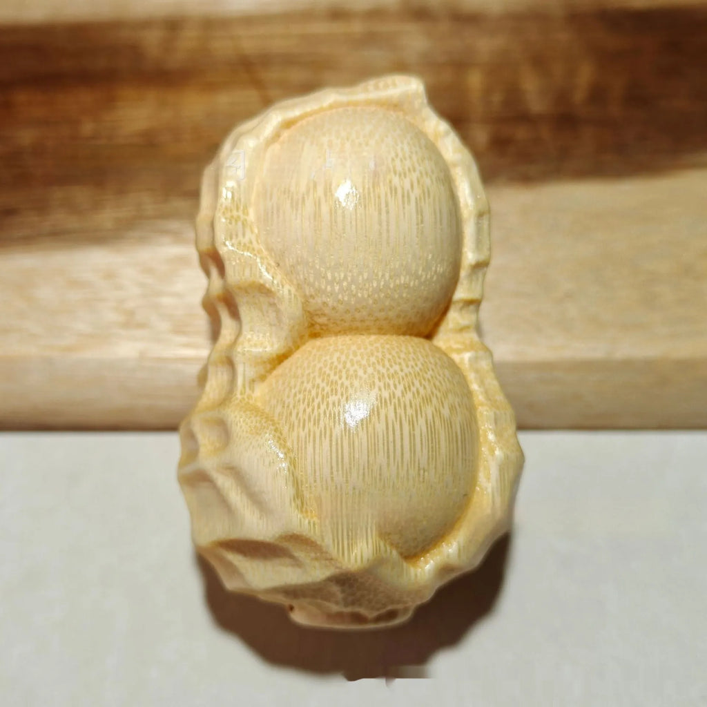 Natural bamboo peanut ornament with modern simplicity design for multiple gifting occasions