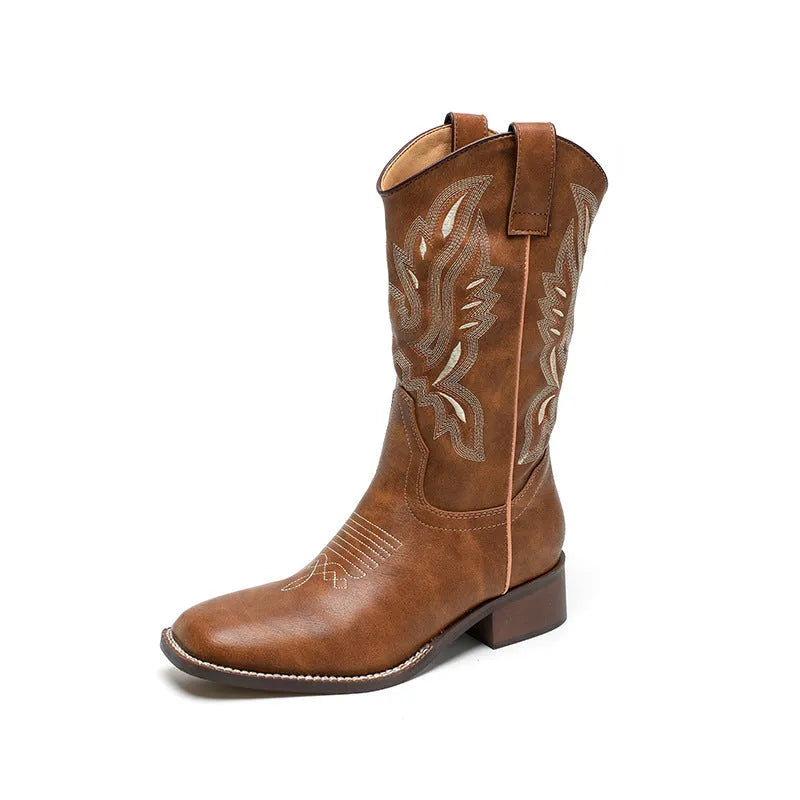Brown embroidered women's mid-calf Martin boots with leather lining and a low square heel.