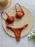 Women's black underwire bikini swimsuit with briefs style on a mannequin.