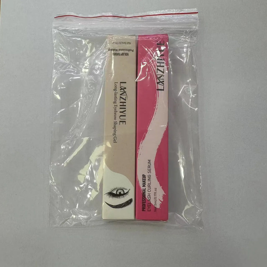 White eyelash growth liquid with applicator brush for lash thickening