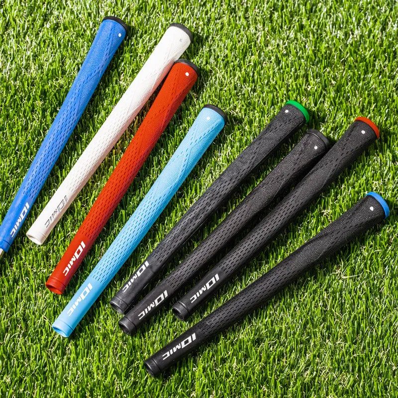 TPE golf club grip showing non-slip texture in multiple colour options including pink, blue, white and two-tone combinations