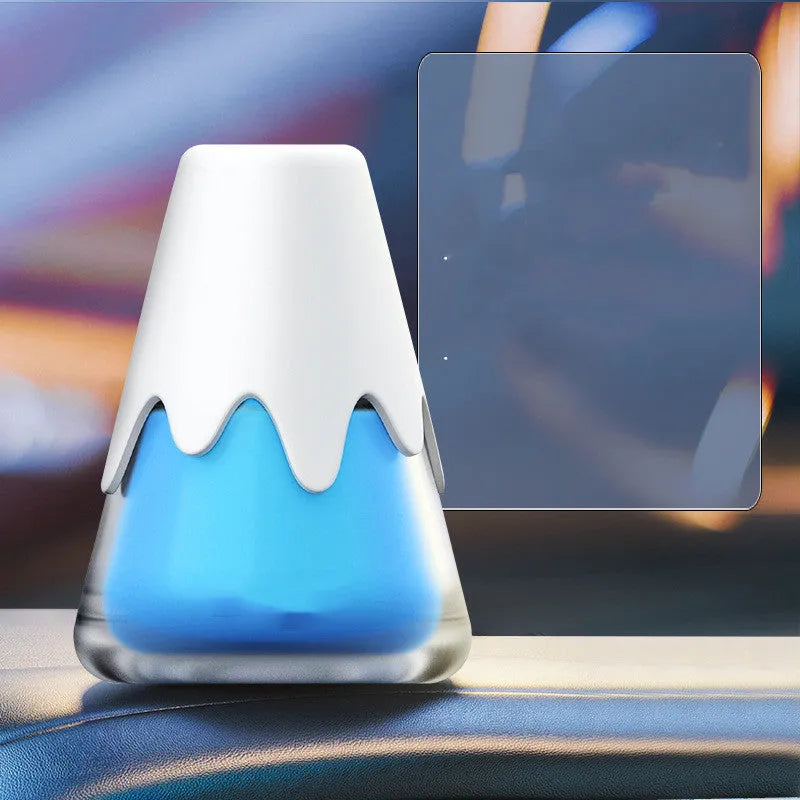 Refillable glass car aromatherapy unit in one of four colour options, showing compact size for dashboard or vent mounting.