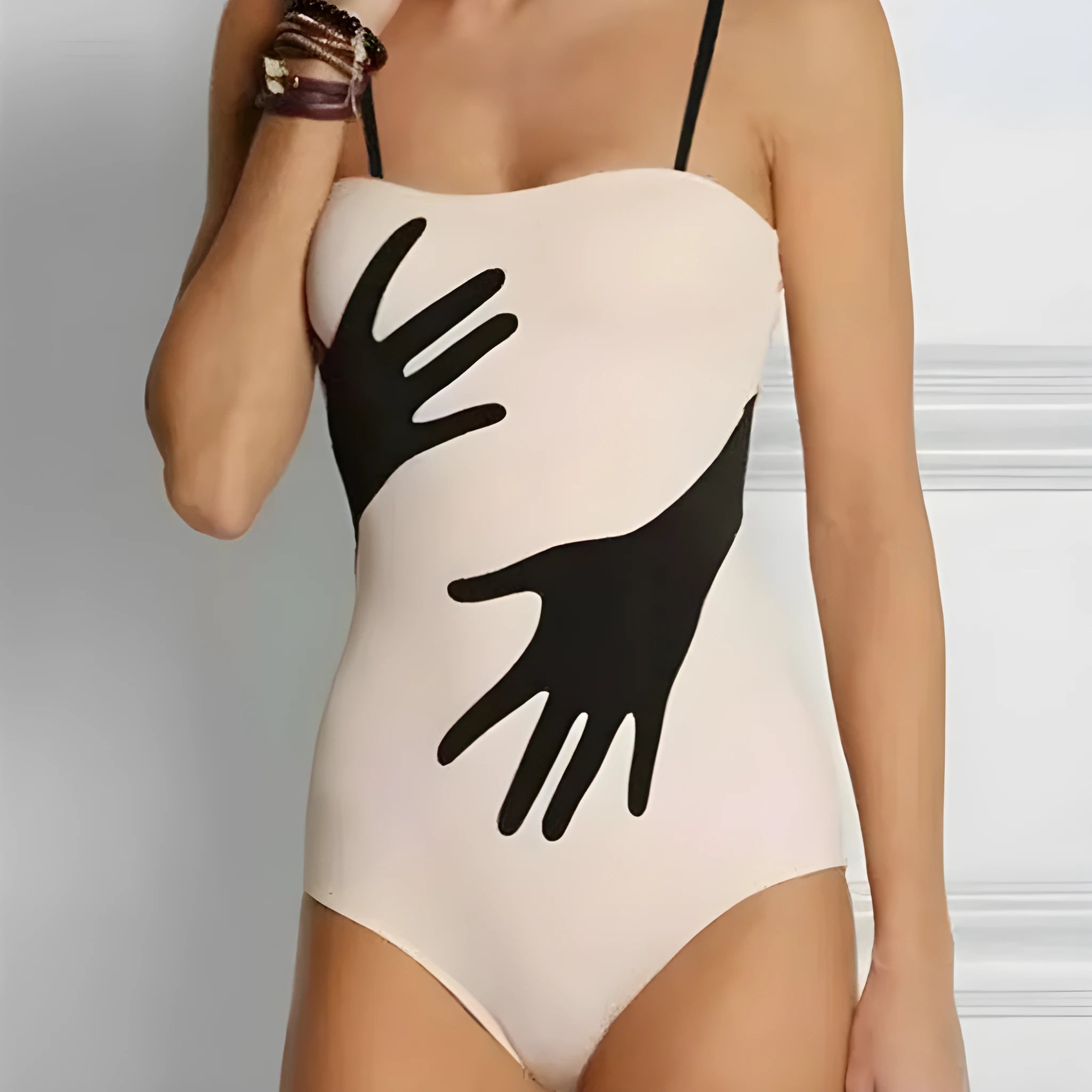 Women's one-piece bikini swimsuit with a gauze skirt overlay in one-piece bikini colour.