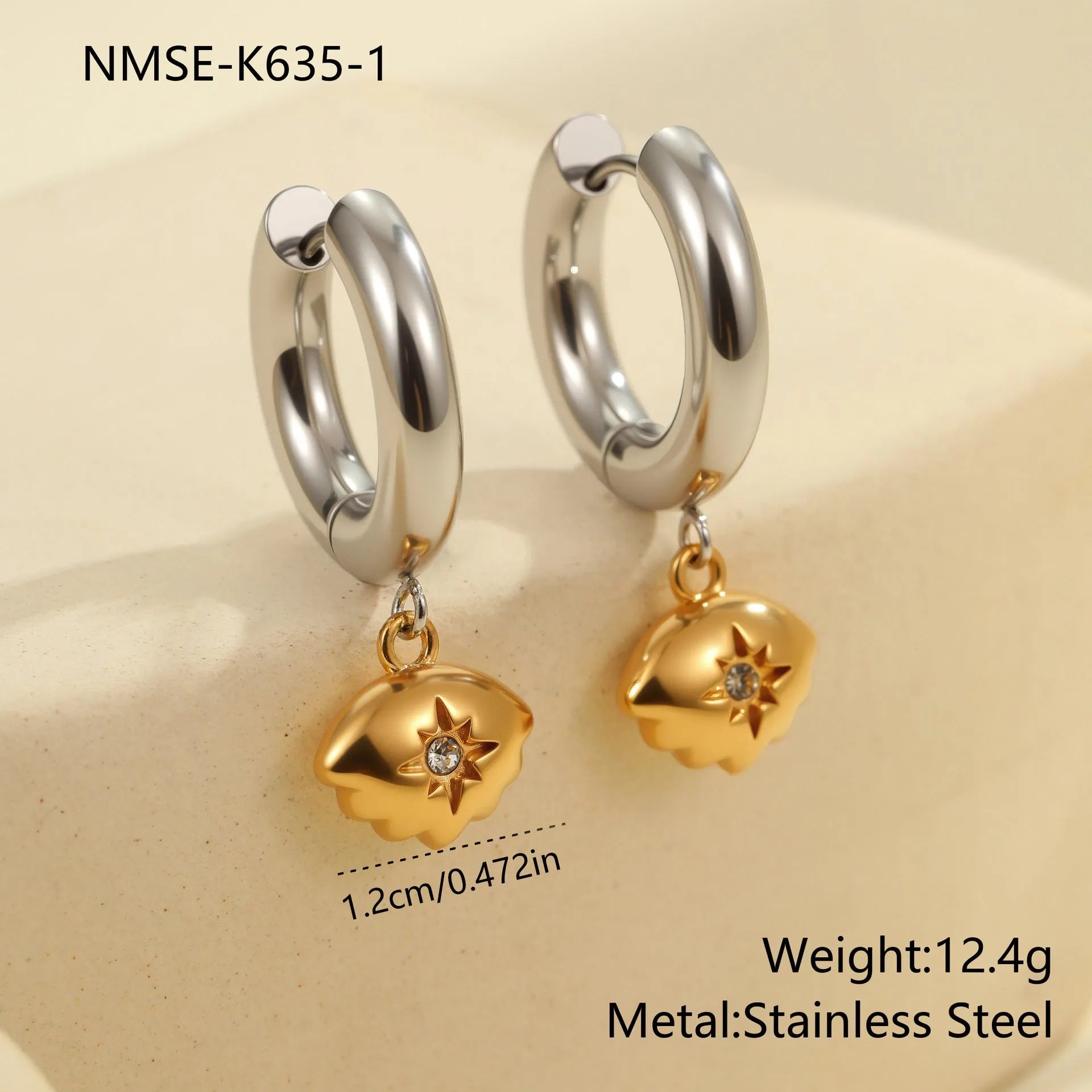 Christmas tree heart earrings in stainless steel with 18K gold plating showing star and geometric shapes