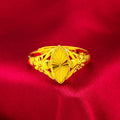 Gold open diamond flower ring with geometric floral pattern and textured brass construction