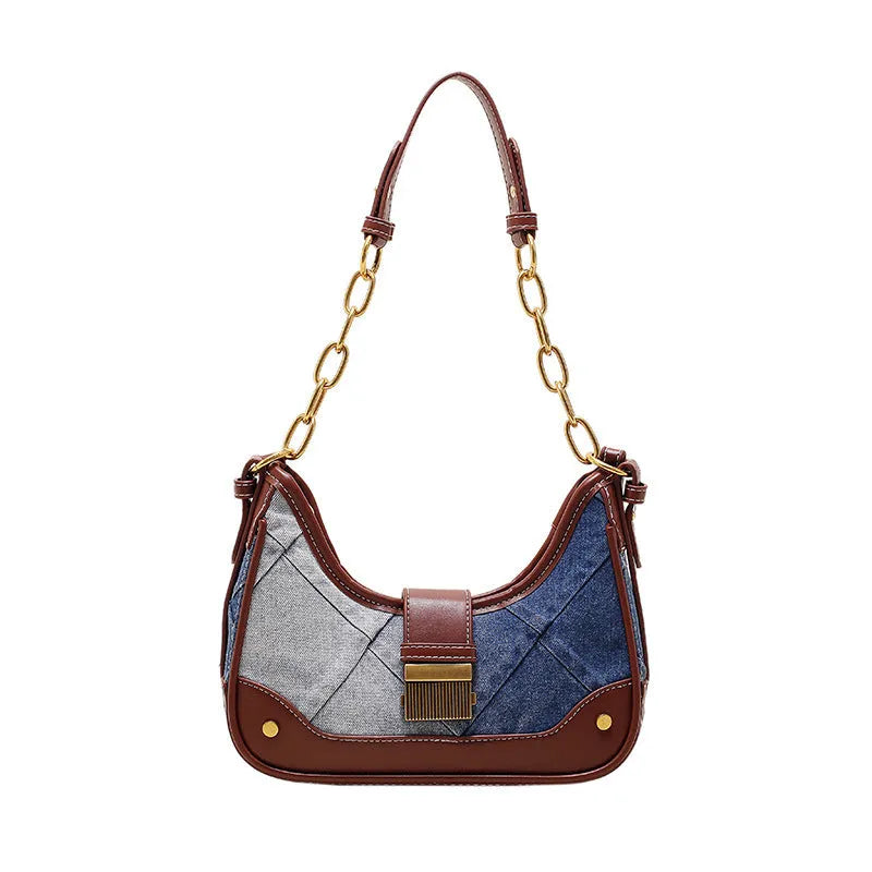 Brown denim bucket shoulder bag with diamond mesh panels and metallic chain strap