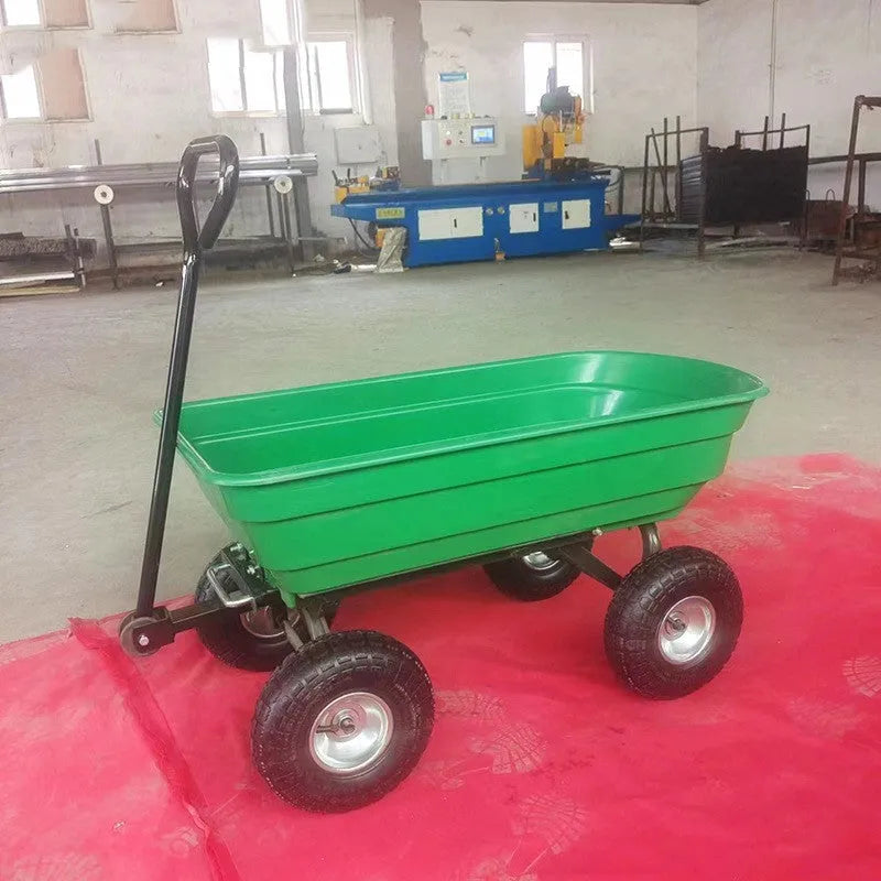 Green four-wheel plastic dump truck with steel PP construction and a tilting cargo bed.