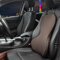 Universal memory cotton car lumbar support cushion in solid colour on a car seat.