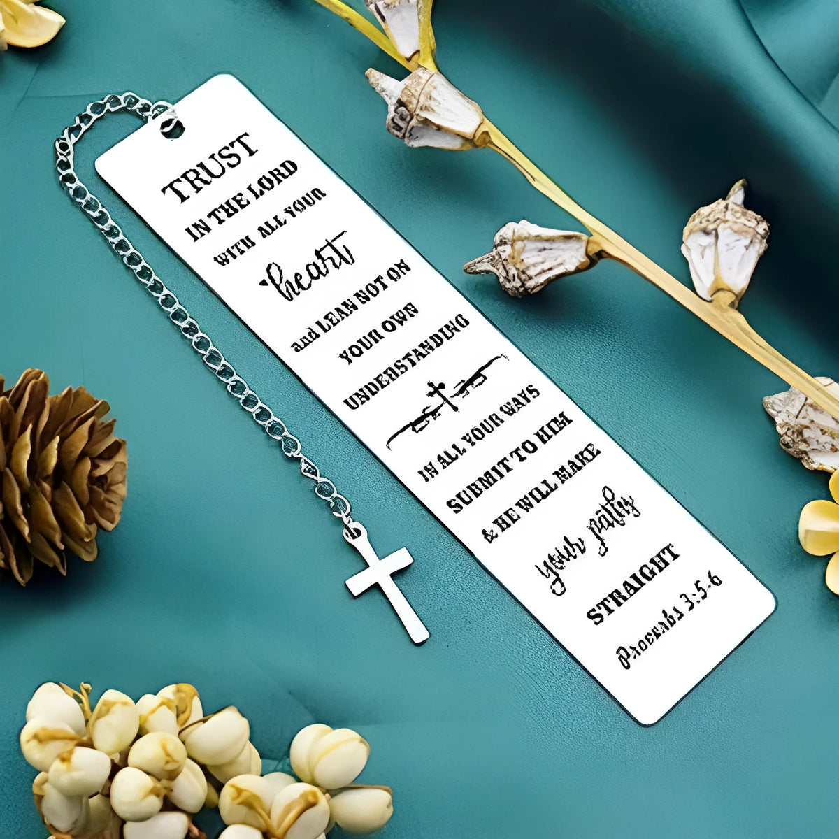 Steel bookmark with an engraved family bible verse design in a metallic finish.