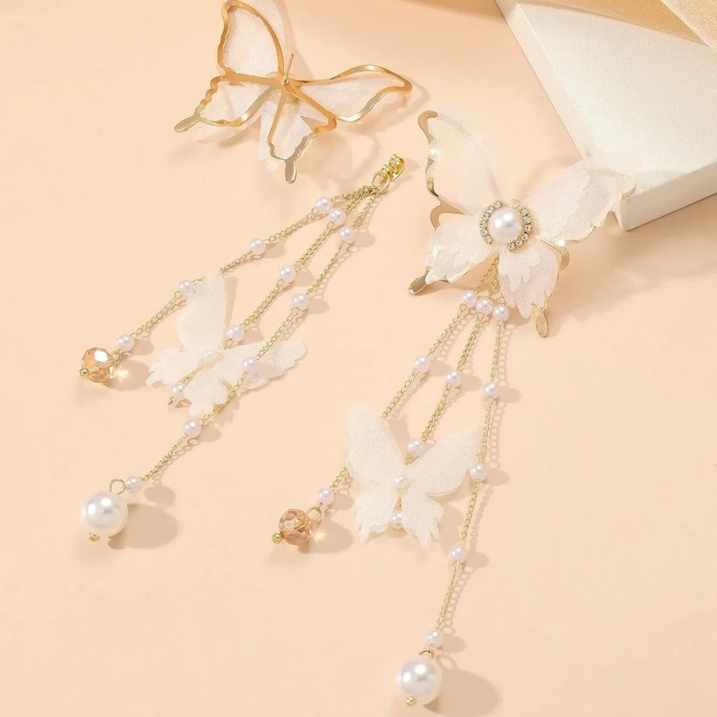 Butterfly-shaped earrings with rhinestones, pearls, and tassel lace on copper alloy with white electroplated finish
