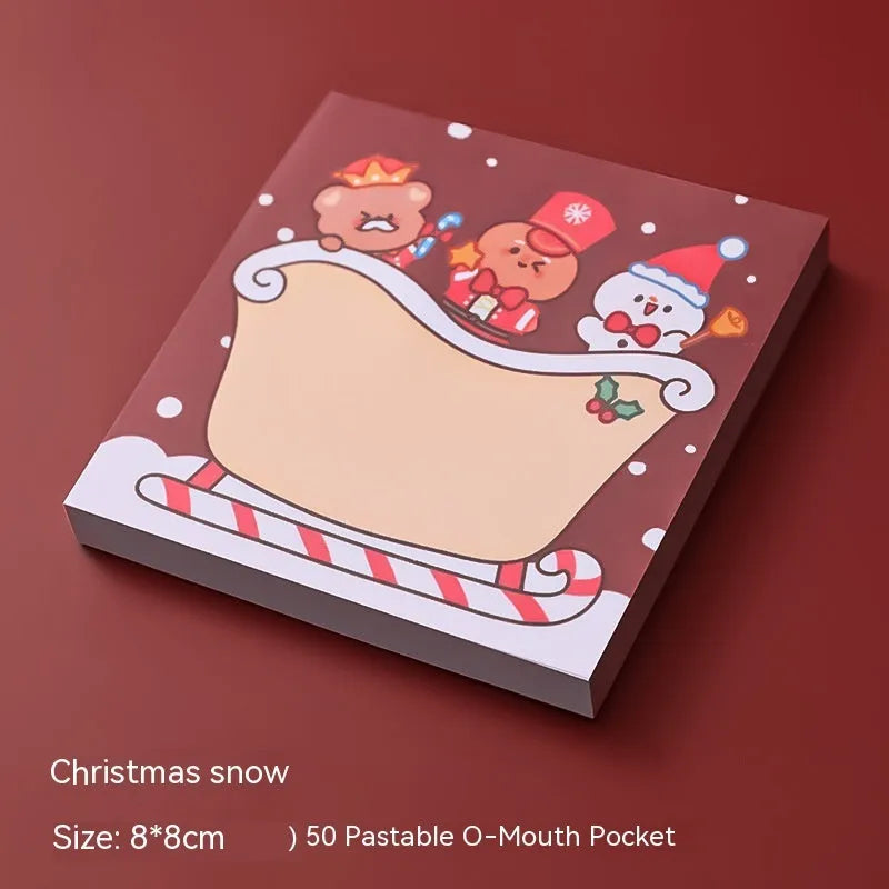 Christmas cartoon sticky notes pad showing eight festive designs including Santa Claus, snowman, and Christmas elf